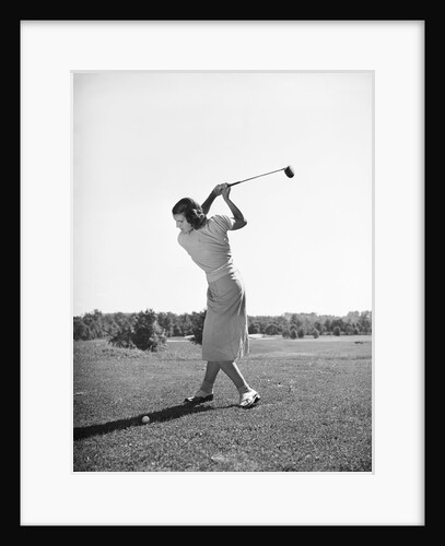 Woman Swinging Golf Club by Anonymous