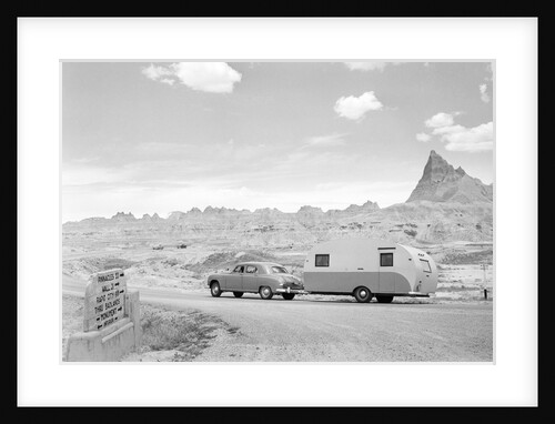 Automobile & Trailer On Badlands Highway by Anonymous