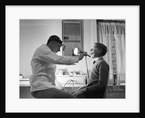 Doctor Examining Boy Patient by Anonymous