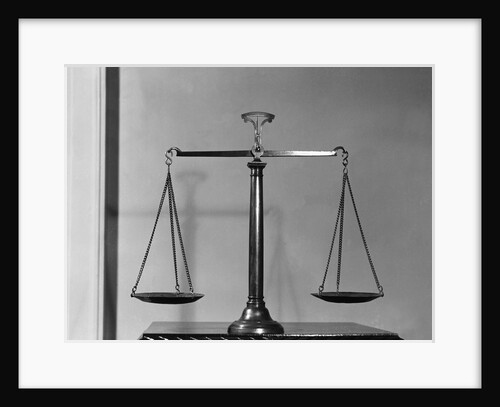 Balancing Scales On Table by Anonymous