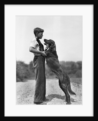 Teenage Boy with Irish Setter by Anonymous