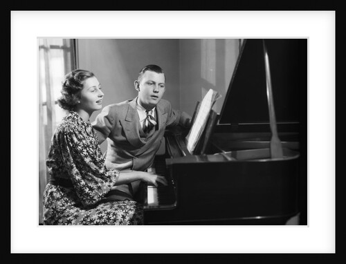 Young Couple Seated at Piano by Anonymous