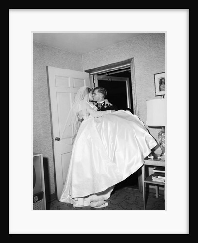 Groom Carrying Bride over Threshhold by Anonymous