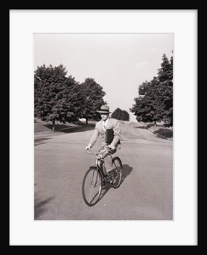 Businessman Riding a Bicycle by Anonymous