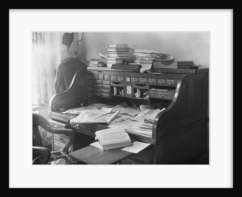Rolltop Desk Littered with Books and Papers by Anonymous