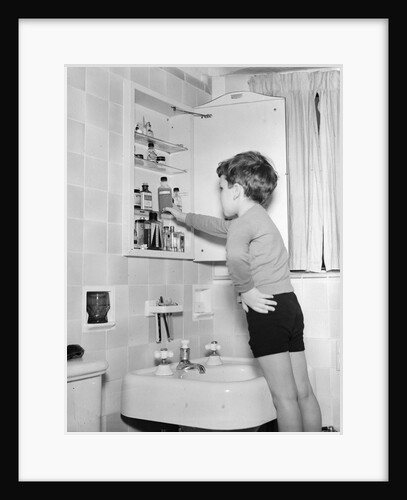 Boy Reaching into Medicine Cabinet by Anonymous