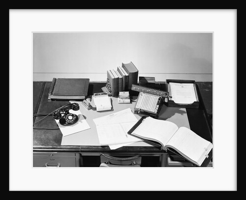 Desk Covered with Assorted Office Supplies by Anonymous