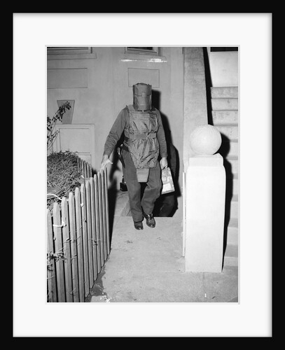 Policeman in Protective Gear Carries Bombs by Anonymous