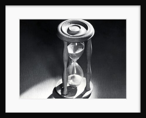 Sand Running Through Hourglass by Anonymous