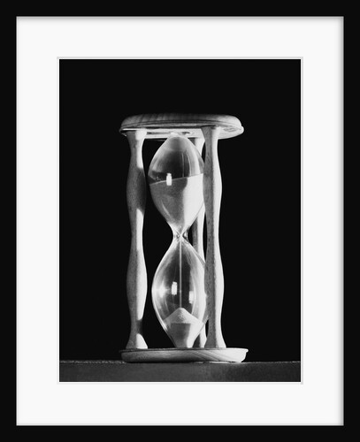 Sand Running Through Hourglass by Anonymous
