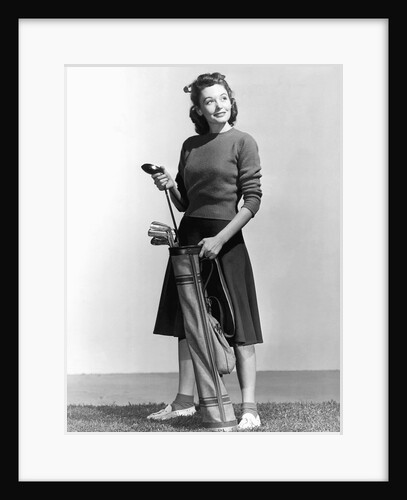 Woman Holding Golf Club And Golf Bag by Anonymous