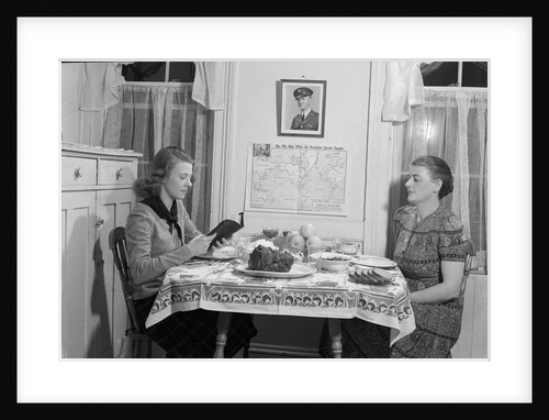 Mother And Daughter Having Dinner by Anonymous