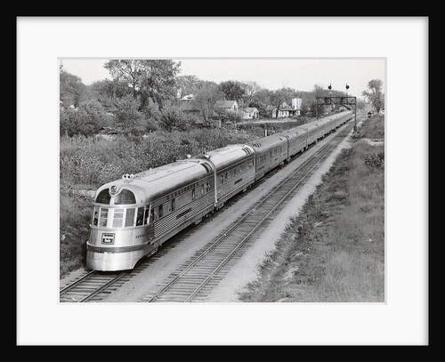Denver Zephyr Train Going Through Town by Anonymous