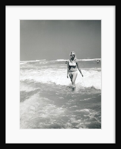 Woman Walks Out Of Ocean Surf by Anonymous