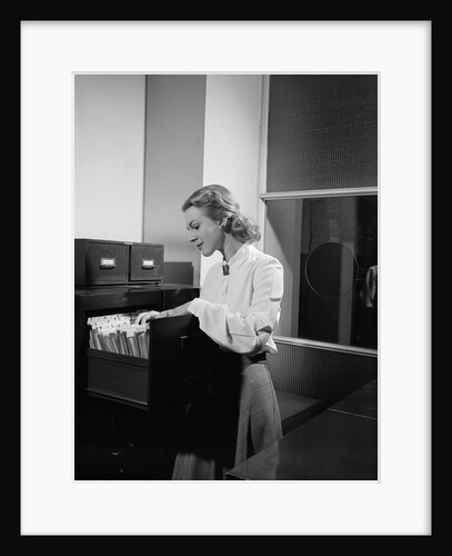 Woman and File Cabinet by Anonymous