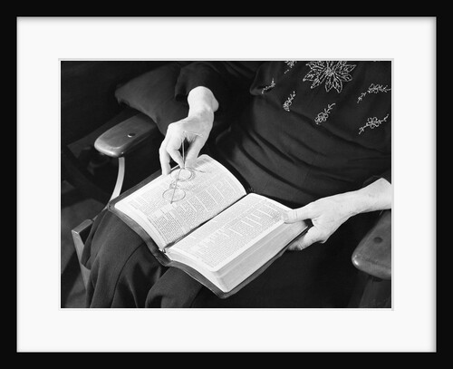 Bible in Woman's Lap by Anonymous