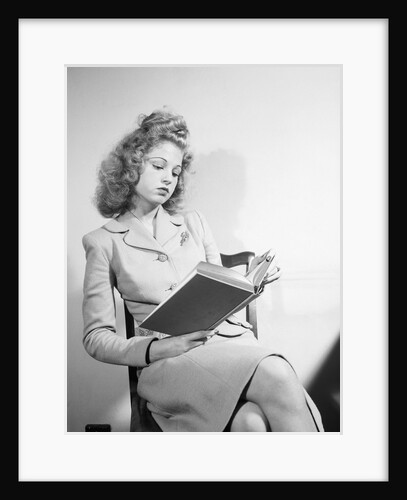 Seated Young Woman Reading by Anonymous