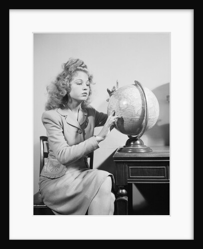 Seated Woman Spinning Globe by Anonymous