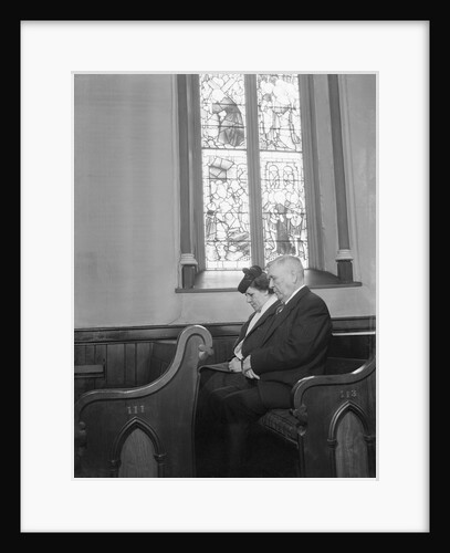 Couple Seated in Church Pew by Anonymous