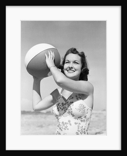 Woman Holding Beach Ball by Anonymous