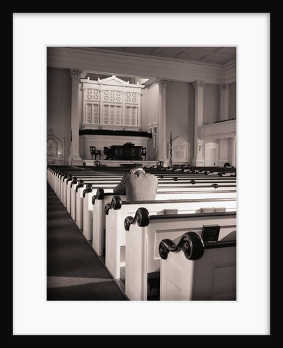 Man Praying in Empty Church by Anonymous