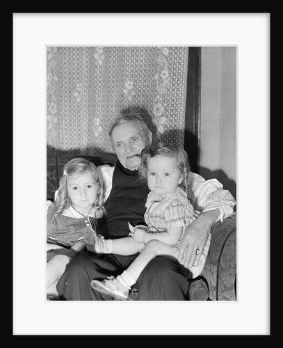 Two Girls on Grandfather's Lap by Anonymous