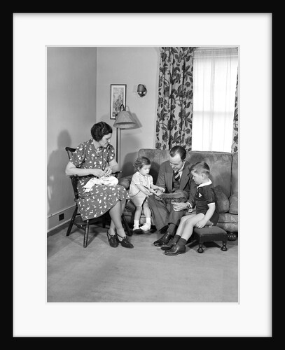 Family Sitting in Living Room by Anonymous