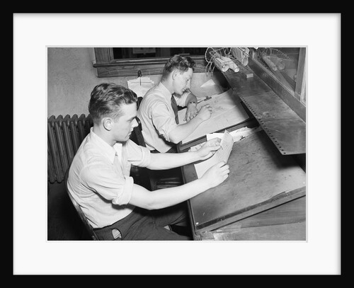 Men At Desks Proofreading Documents by Anonymous