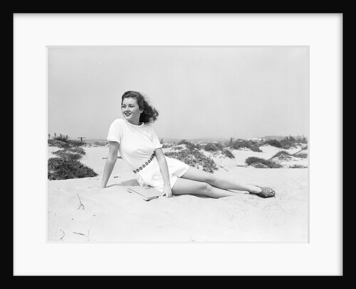 Young Woman Seated on the Beach by Anonymous