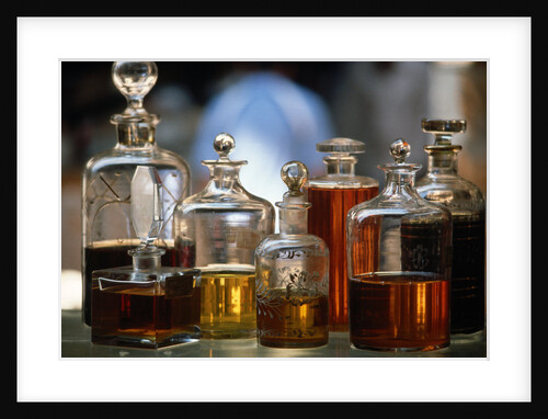 Display Of Perfume Bottles In Market by Anonymous