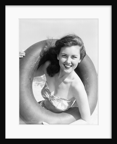 Woman with Head Through Inner Tube by Anonymous