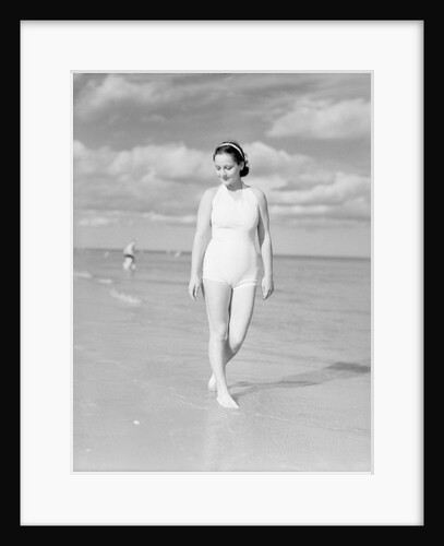 Woman Casually Strolling Along the Beach by Anonymous