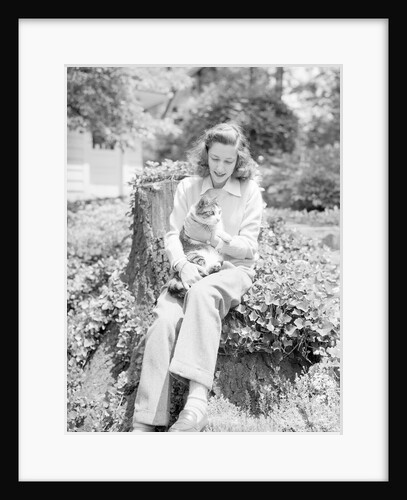 Seated Woman Holding Cat by Anonymous