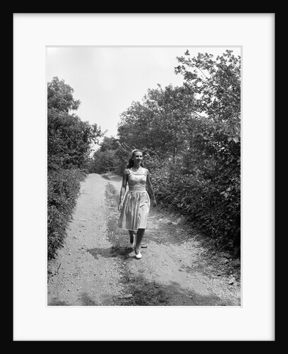 Woman Walking on Country Road by Anonymous