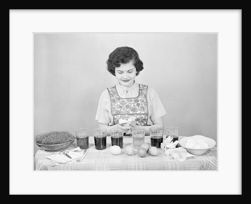 Woman Coloring Easter Eggs by Anonymous