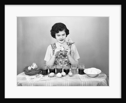 Woman Coloring Easter Eggs with a Paintbrush by Anonymous