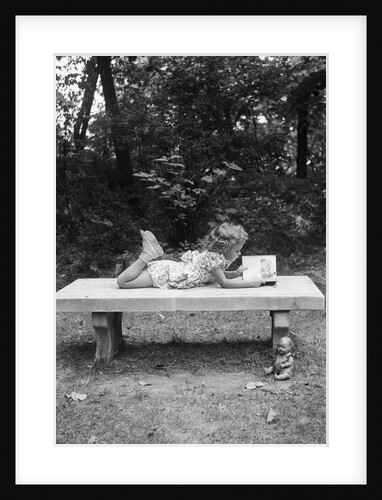 Girl Reading on Bench by Anonymous