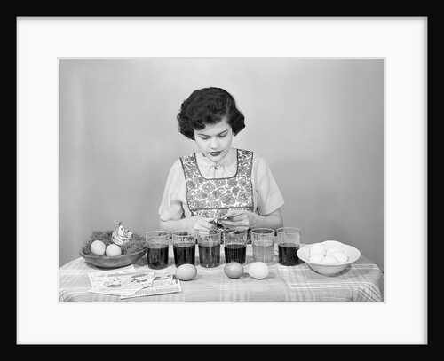 Girl Coloring Easter Eggs by Anonymous