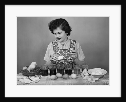 Girl Coloring Easter Eggs by Anonymous