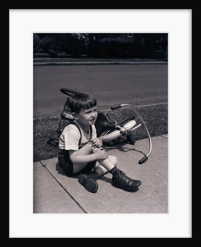 Boy Fallen Off Tricycle and Holding Knee by Anonymous