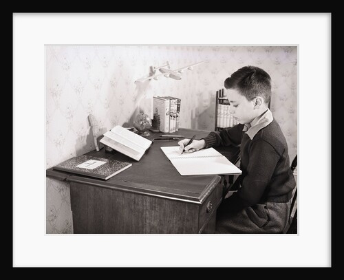 Boy Writing at Desk by Anonymous