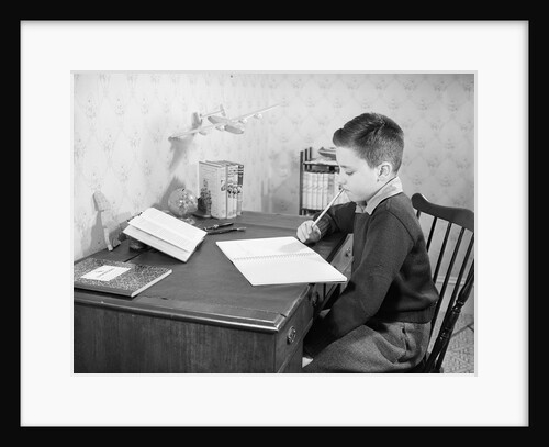 Boy Studying at Desk by Anonymous