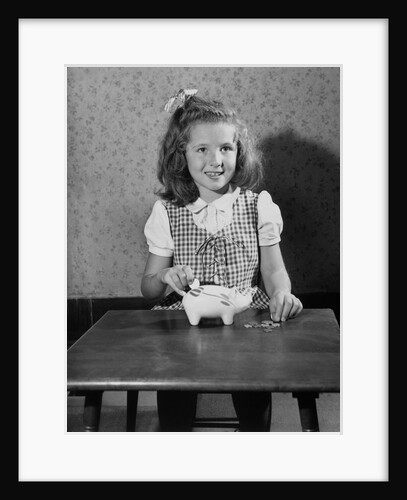 Girl Putting Money In Piggy Bank by Anonymous