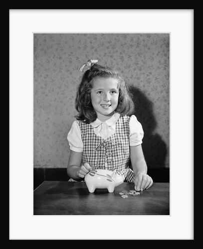 Girl Putting Money In Piggy Bank by Anonymous