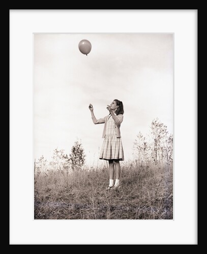 Girl Holding a Balloon by Anonymous