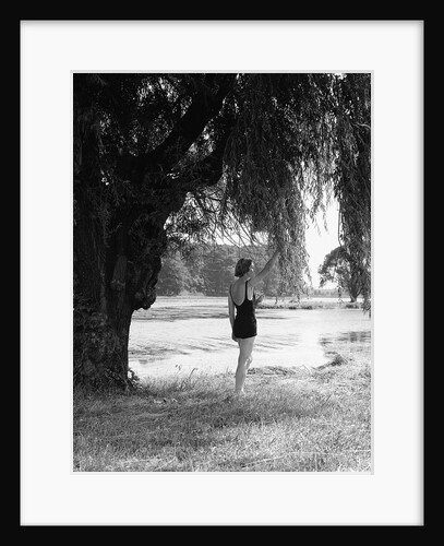 Woman Standing Under a Tree by Anonymous