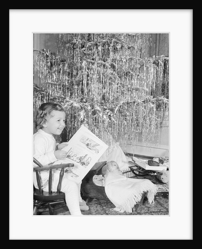 Girl Sitting Beside Christmas Tree by Anonymous