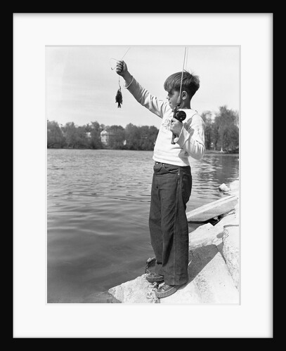 Boy Holding a Small Fish by Anonymous