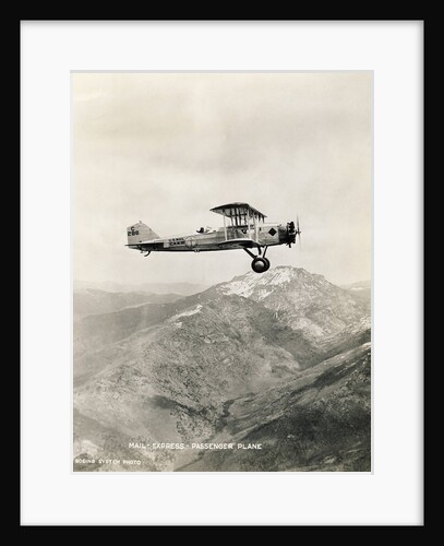 Mail Biplane Flying over Mountains by Anonymous