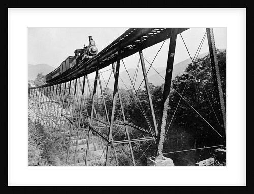 Train Crossing Railroad Trestle by Anonymous